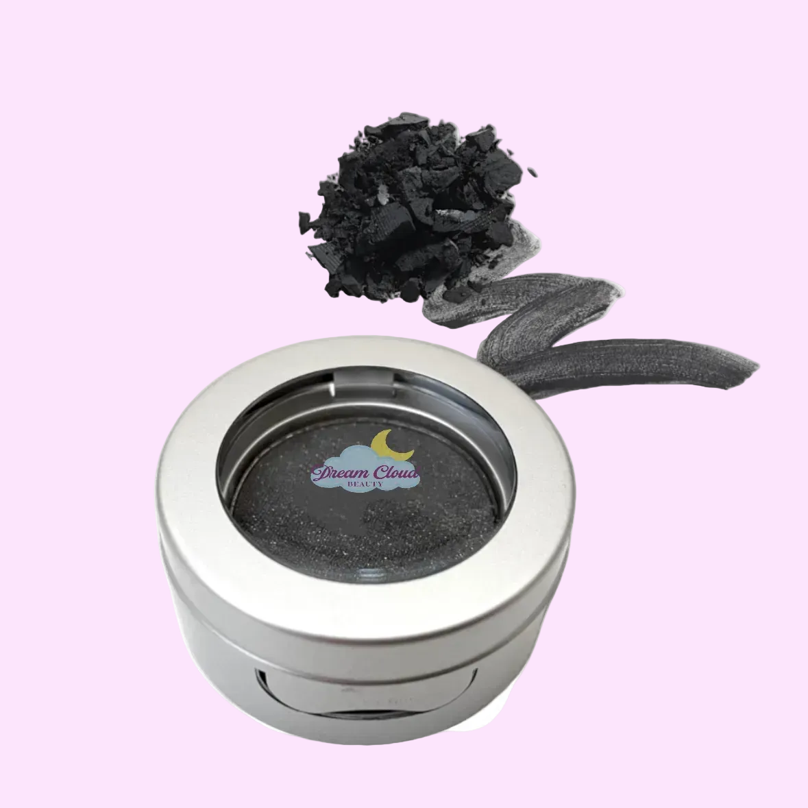 Silver container with black powder and a small plant on a white background