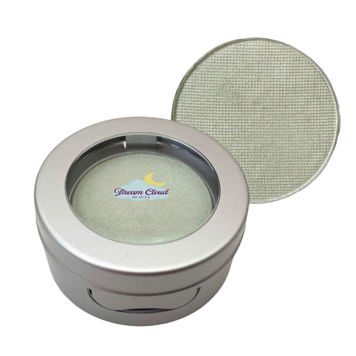 Makeup compact with green eyeshadow and 'Dream Cloud' branding on a white background